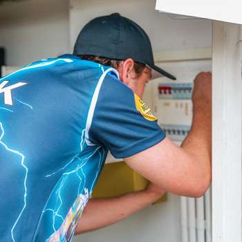 electrician diagnosing Electrical Fault